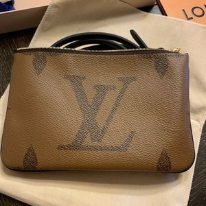 Reverse monogram Pochette